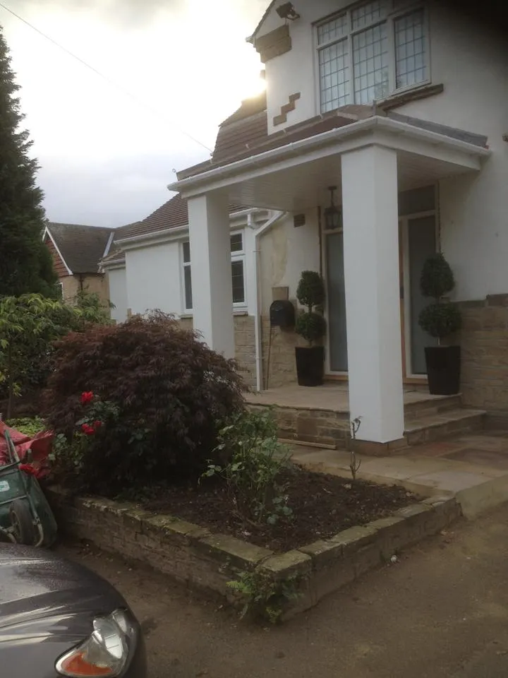 a house with a car parked in front of it